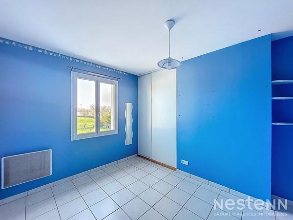 A Vendre Maison de 110 m² avec garage en sous-sol et jardin clôturé à Condom