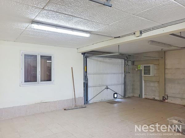 A Vendre Maison de 110 m² avec garage en sous-sol et jardin clôturé à Condom