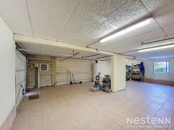 A Vendre Maison de 110 m² avec garage en sous-sol et jardin clôturé à Condom