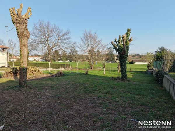 A Vendre Maison de 110 m² avec garage en sous-sol et jardin clôturé à Condom