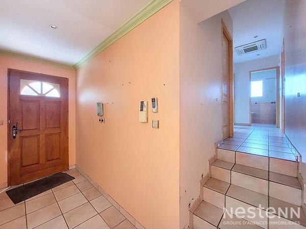 A Vendre Maison de 110 m² avec garage en sous-sol et jardin clôturé à Condom