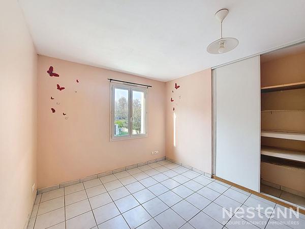 A Vendre Maison de 110 m² avec garage en sous-sol et jardin clôturé à Condom