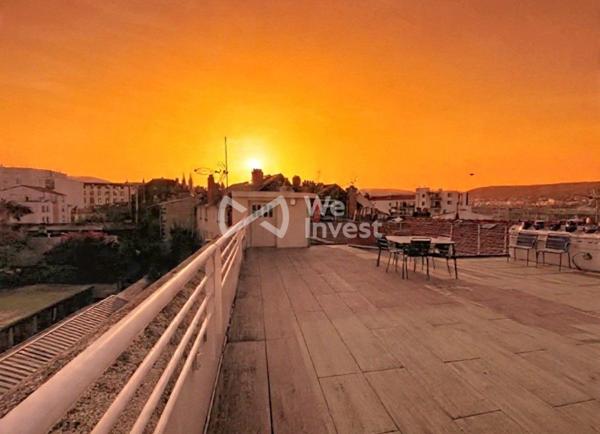 Appartement de type 2 avec spacieuse terrasse de 76 m2.