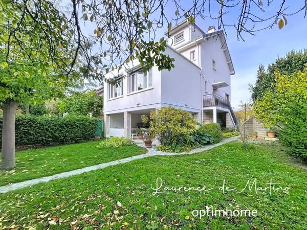 Maison familiale avec terrasse, jardin et garage double – à 10 min du RER Nanterre-Ville