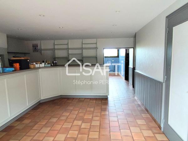 Appartement et Local commercial de 207 m²