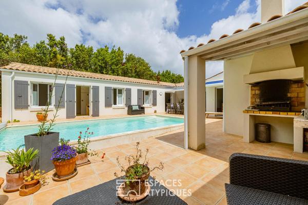 Villa avec piscine dans un écrin paysager