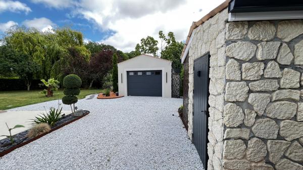 Maison de 62m2 à finir sur terrain arboré et paysagé