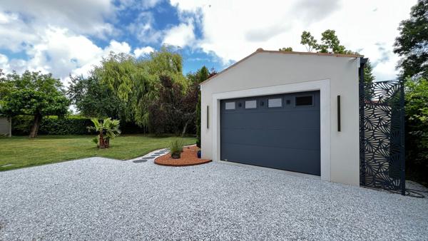 Maison de 62m2 à finir sur terrain arboré et paysagé