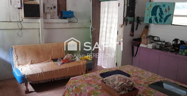 Terrain de loisir, pente douce, carbet, atelier, crique