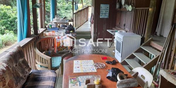 Terrain de loisir, pente douce, carbet, atelier, crique