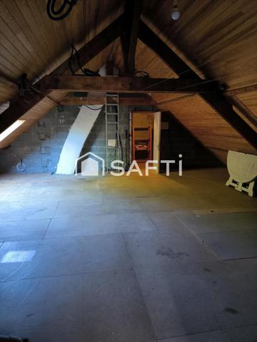 Maison de plain-pied au coeur du centre ville de Cordemais avec grand terrain et combles aménageables.