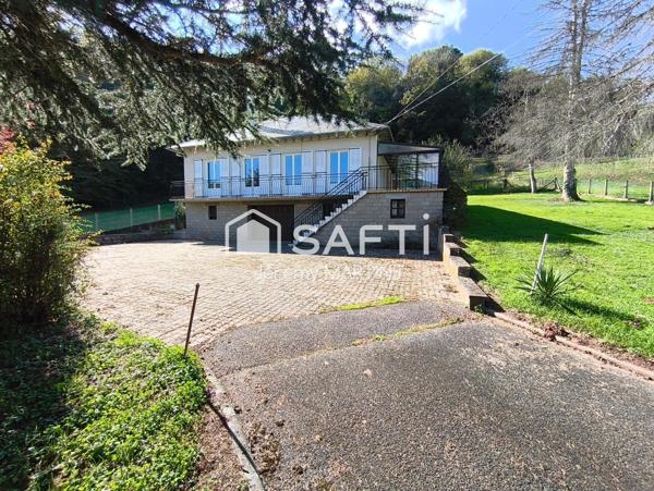 Maison familiale avec véranda, garage et terrain