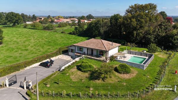 Séjour lumineux, 4 chambres, piscine et jardin arboré : une maison prête à accueillir votre famille