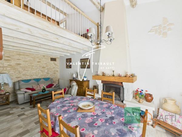 À Iteuil, aux portes de Poitiers : belle maison en pierres rénovée avec goût. 4 chambres, véranda, garage et jardin de 1 200 m²