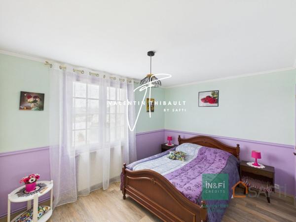 À Iteuil, aux portes de Poitiers : belle maison en pierres rénovée avec goût. 4 chambres, véranda, garage et jardin de 1 200 m²