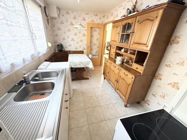 Appartement 2 pièces 54m² en rez-de-jardin à Herrlisheim avec garage