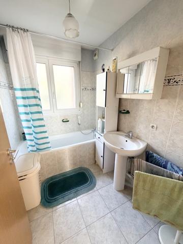 Appartement 2 pièces 54m² en rez-de-jardin à Herrlisheim avec garage