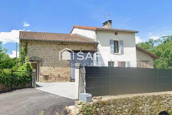 Maison Limousin en pierre avec sa grange attenante sur un terrain bien entretenu de 2600m2
