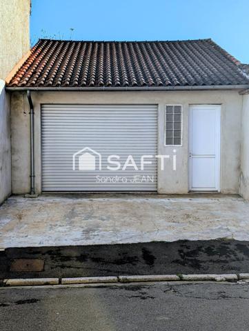 Maison de ville avec un grand garage