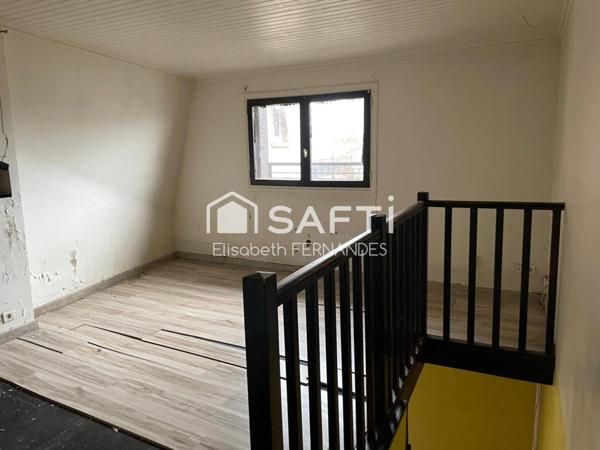 Appartement duplex à usage commercial