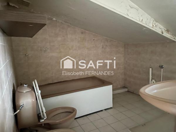 Appartement duplex à usage commercial