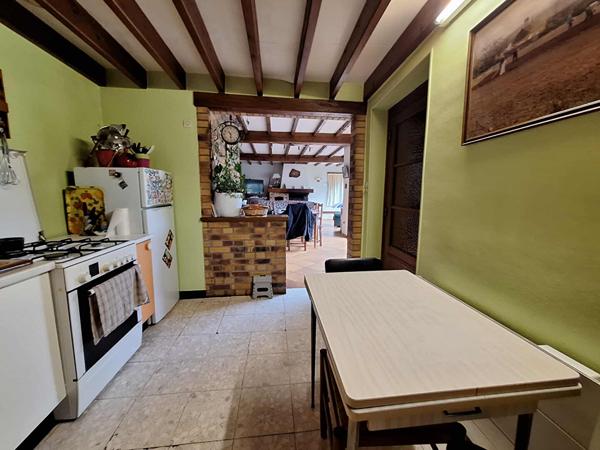 RUE maison en centre ville + local commercial