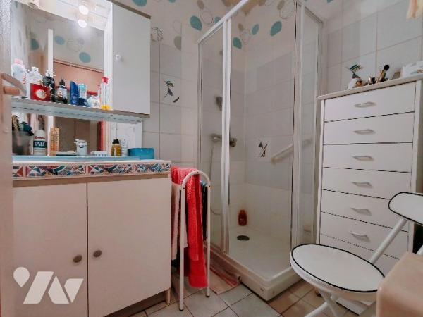Appartement rez-de-chaussée proche centre-ville