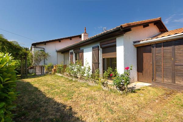 Maison familiale 4 chambres avec grand terrain et garage à Vayres (33870)