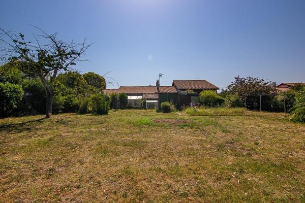 Maison familiale 4 chambres avec grand terrain et garage à Vayres (33870)
