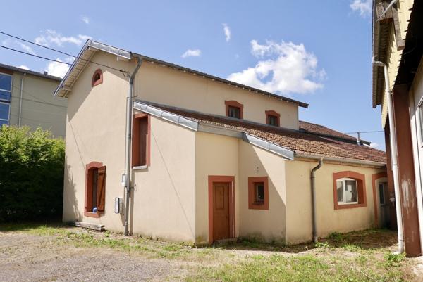 IMMEUBLE A USAGE DE BUREAUX OU AUTRES...