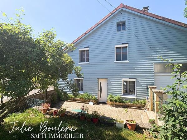 Charmante maison avec garage et jardin