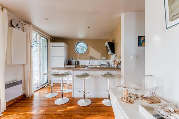 Maison bardage bois de 65 m². 2 chambres .garage .calme, jardin et terrasse