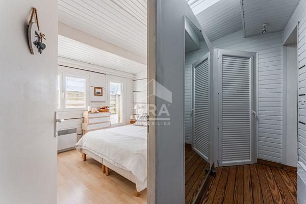 Maison bardage bois de 65 m². 2 chambres .garage .calme, jardin et terrasse