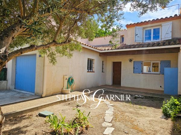 Charmante villa avec garage et jardin