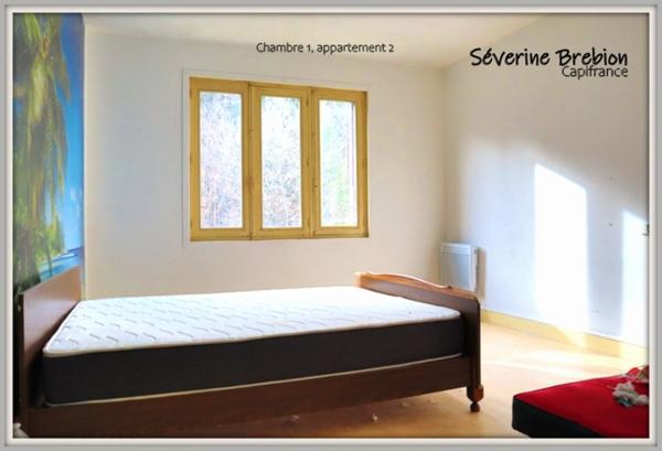 Immeuble vide composé de 2 appartements, 2 garages et un terrain à vendre CHABRELOCHE (63)