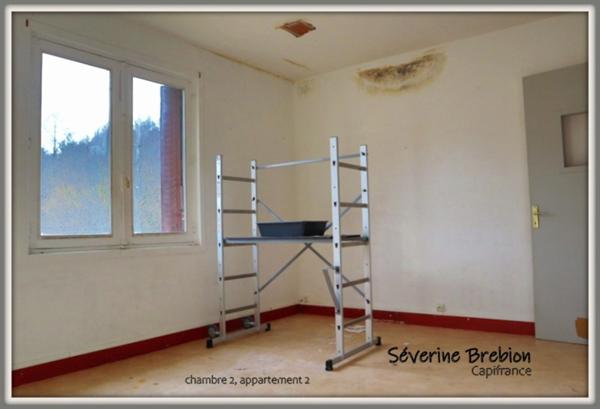 Immeuble vide composé de 2 appartements, 2 garages et un terrain à vendre CHABRELOCHE (63)