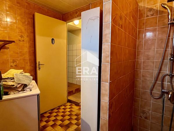 AU COEUR DU VILLAGE MAISON AVEC GARAGE ET COUR