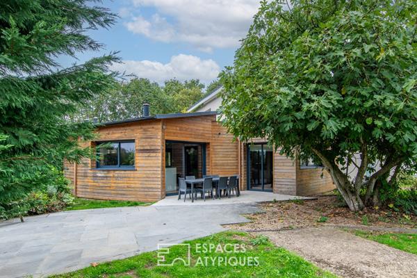 Maison Familiale et son jardin verdoyant