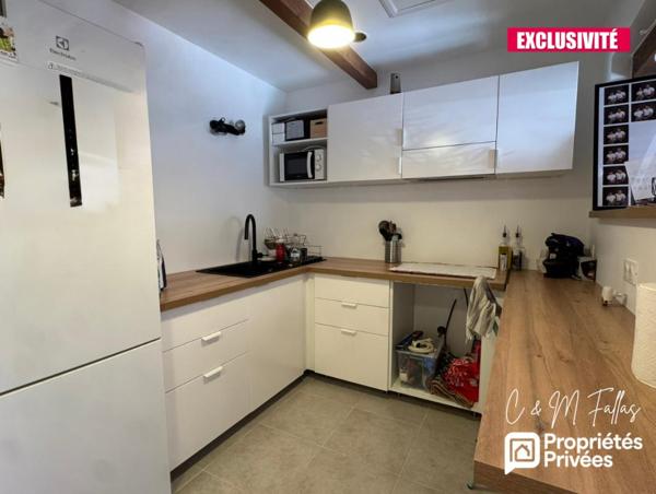 Ensemble immobilier avec appartement rénové - TRAVAILLAN - 220m²