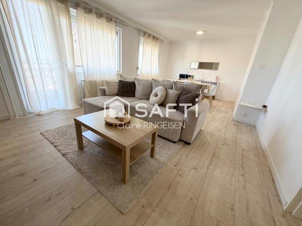 Appartement rénové de 87m² avec terasse, cave et garage