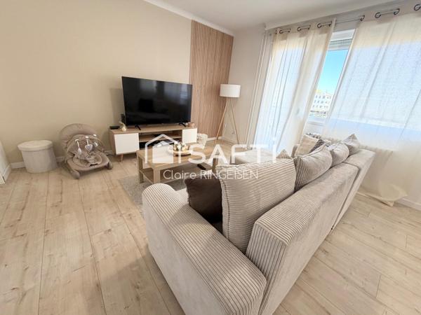 Appartement rénové de 87m² avec terasse, cave et garage