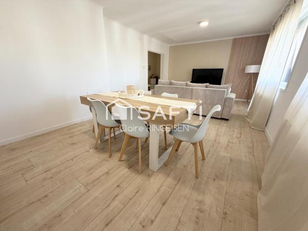 Appartement rénové de 87m² avec terasse, cave et garage