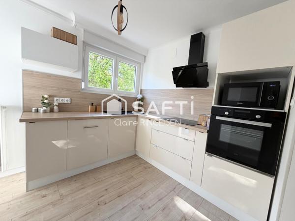 Appartement rénové de 87m² avec terasse, cave et garage