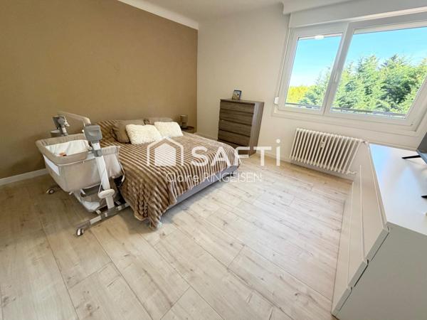 Appartement rénové de 87m² avec terasse, cave et garage
