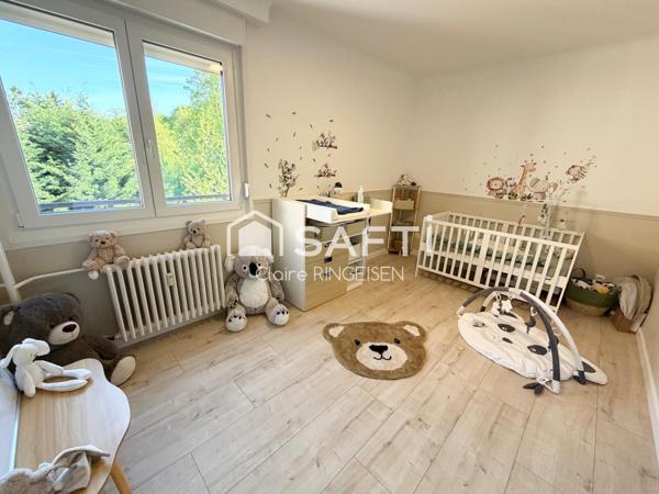 Appartement rénové de 87m² avec terasse, cave et garage