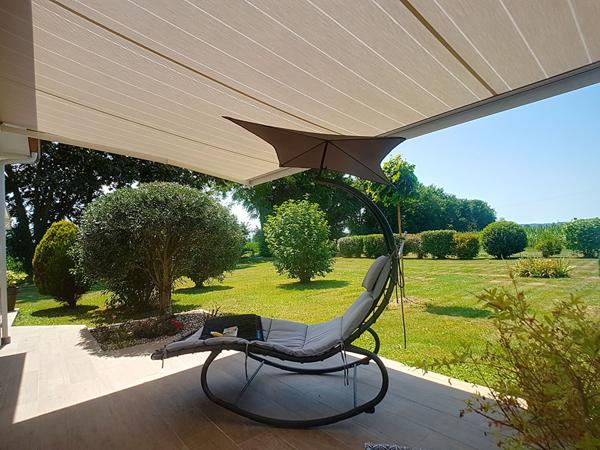 A VENDRE Maison Uzein 5 pièces 91,48 m2 de plain-pied de 2014 séjour avec poêle à granulés cuisine aménagée équipée 2 terrasses cellier 2 garages 2 places de parking couvertes.