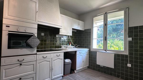 VILLA COMPOSEE D UN T4 ET T2 AVEC TERRASSES JARDIN GARAGE ET CAVE A MANOSQUE