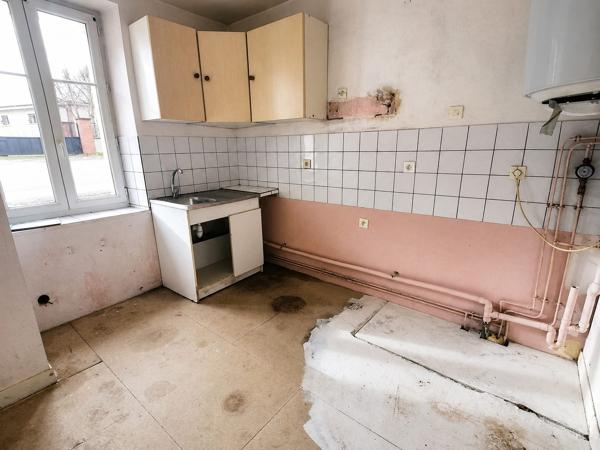 Maison divisée en deux appartements - spécial investisseurs