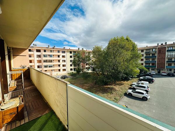 APPARTEMENT CLIMATISE AVEC 2 CHAMBRES CAVE ET TERRASSE