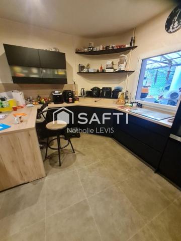 Proche de LENS, immeuble mixte rénové avec une habitation et un local commercial en activité